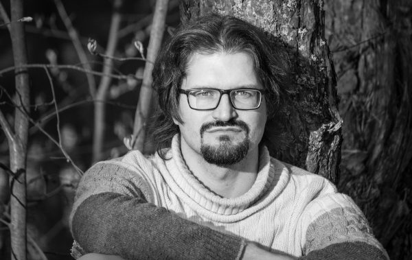 Man Sitting in The Woods Black and White